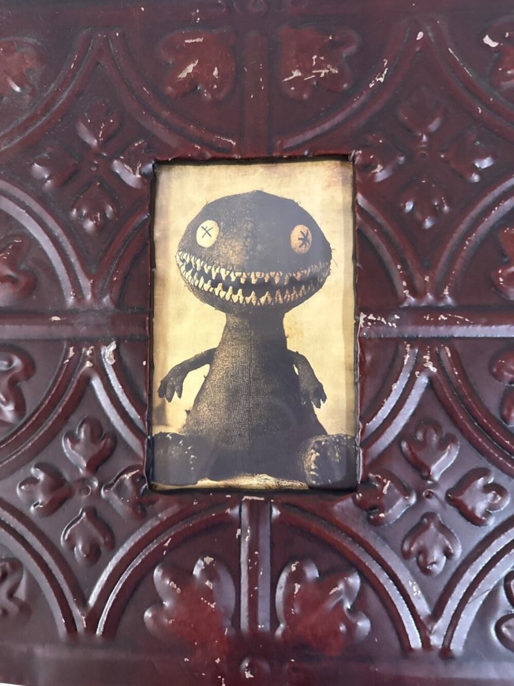 Vintage Embossed Tin Photo Frame With Gothic Motif And Creepy Doll Artwork